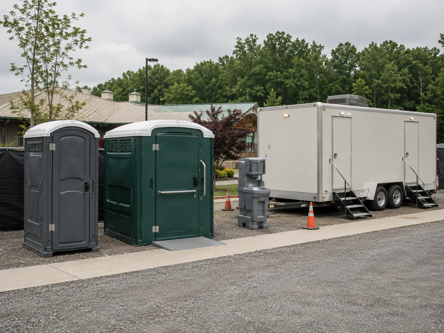 Standard portable toilet, ADA unit, and restroom trailer displayed together