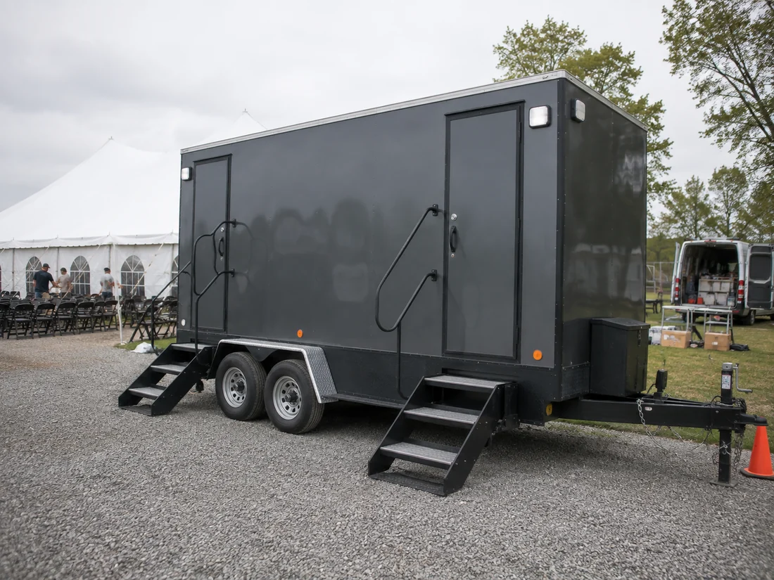 Luxury portable restroom trailer prepared for an event