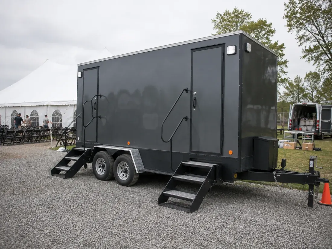 Luxury portable restroom trailer prepared for an event